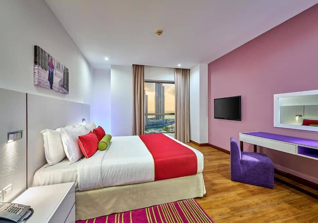 rooms-2bedroom-suite-balcony-city-view