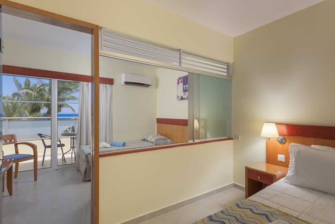 rooms-family-room-2-bedrooms-garden-view-balcony-or-terrace