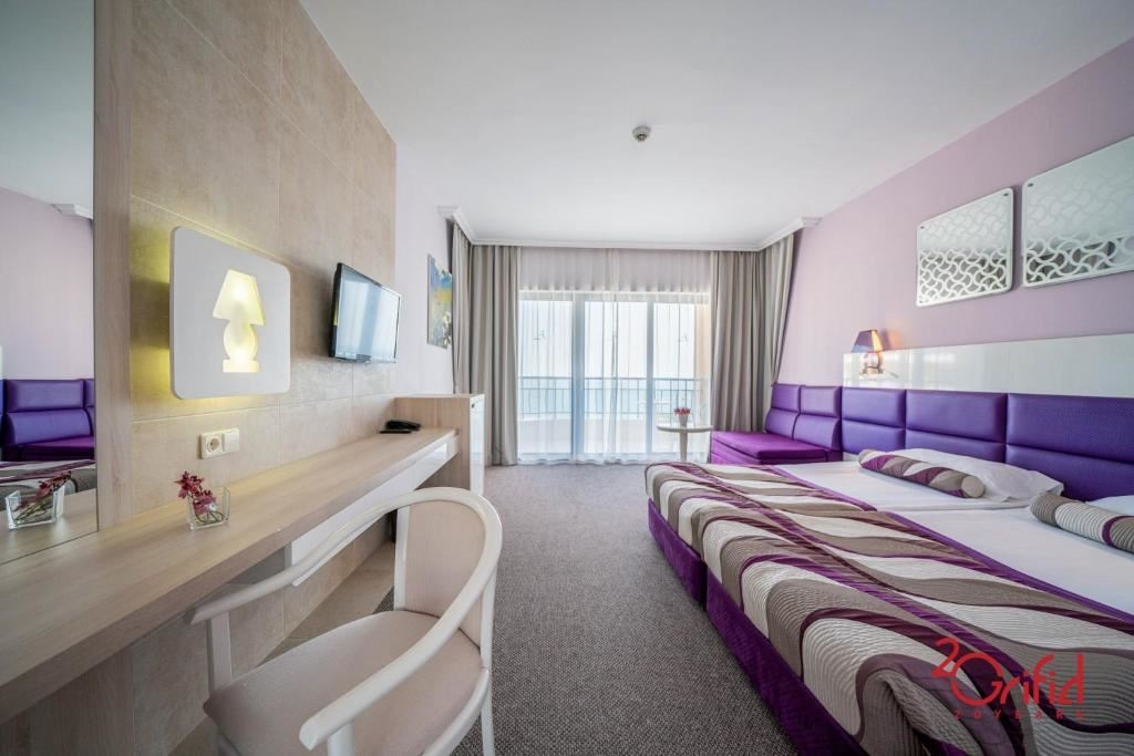 rooms-twin-deluxe-room-sea-view-balcony