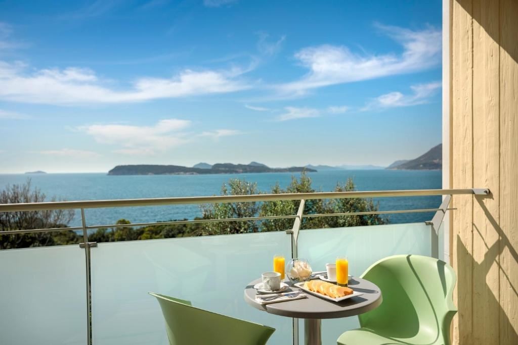 rooms-double-superior-room-seaside-balcony-or-terrace