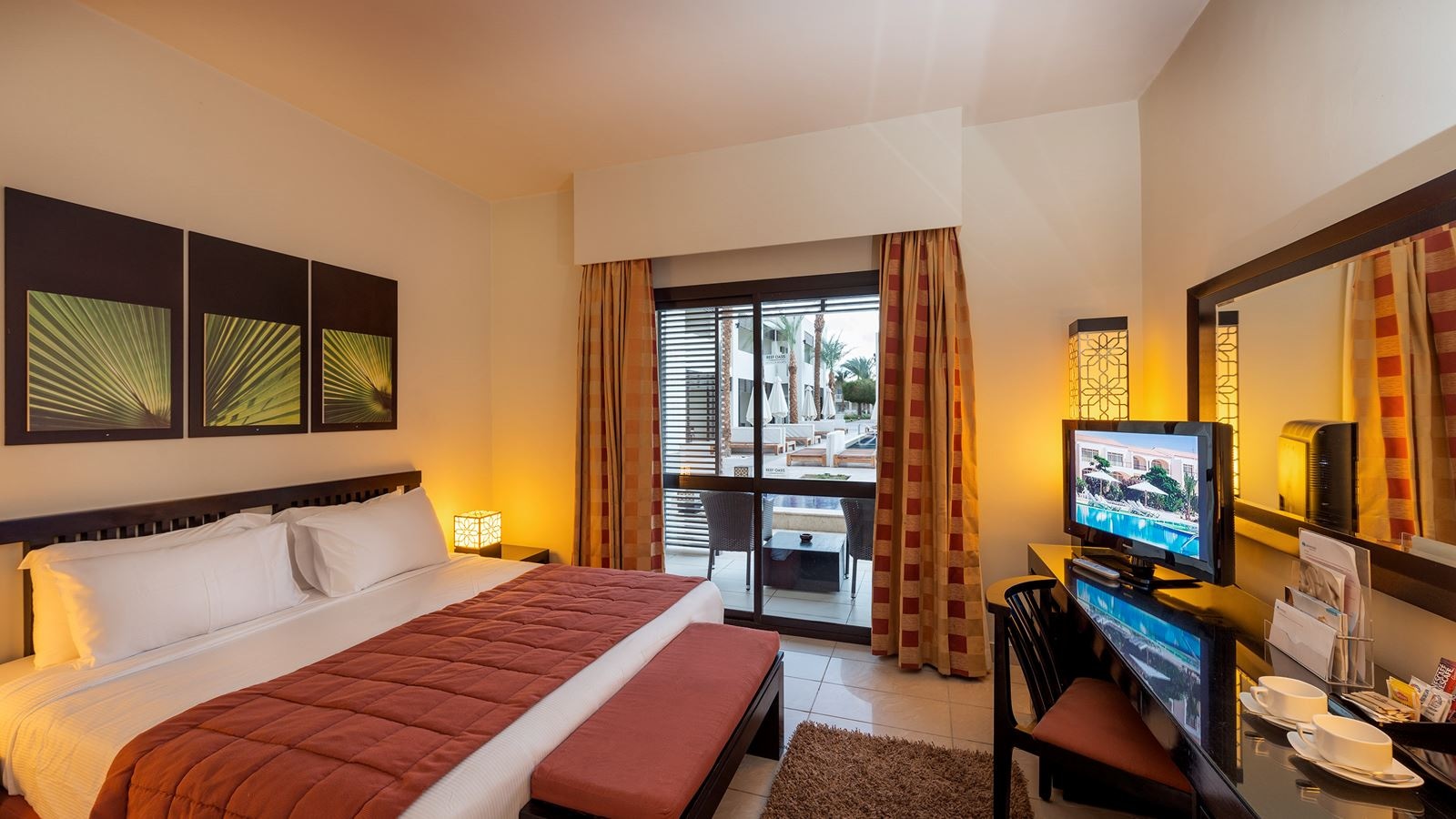 rooms-triple-family-room-garden--pool-view