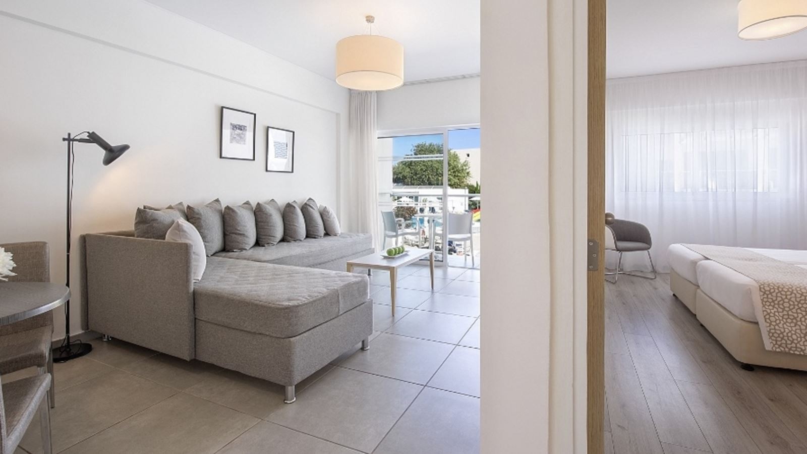 rooms-deluxe-family-room-pool-view-balcony-or-terrace