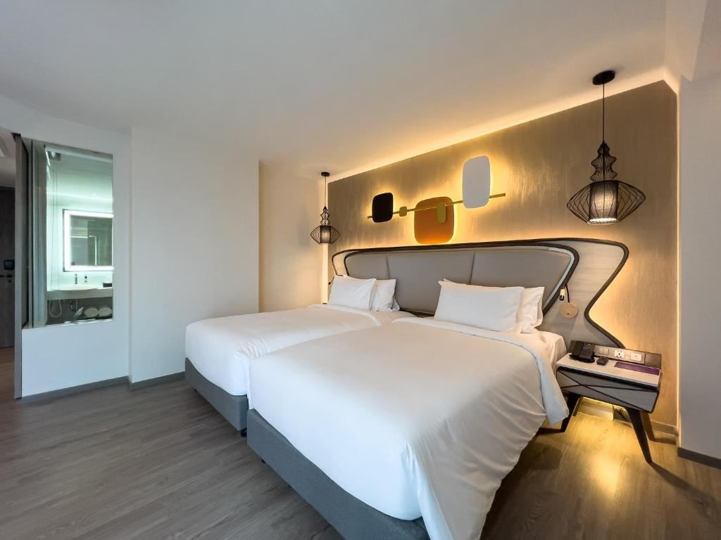 rooms-premier-twin-bed-room-with-balcony