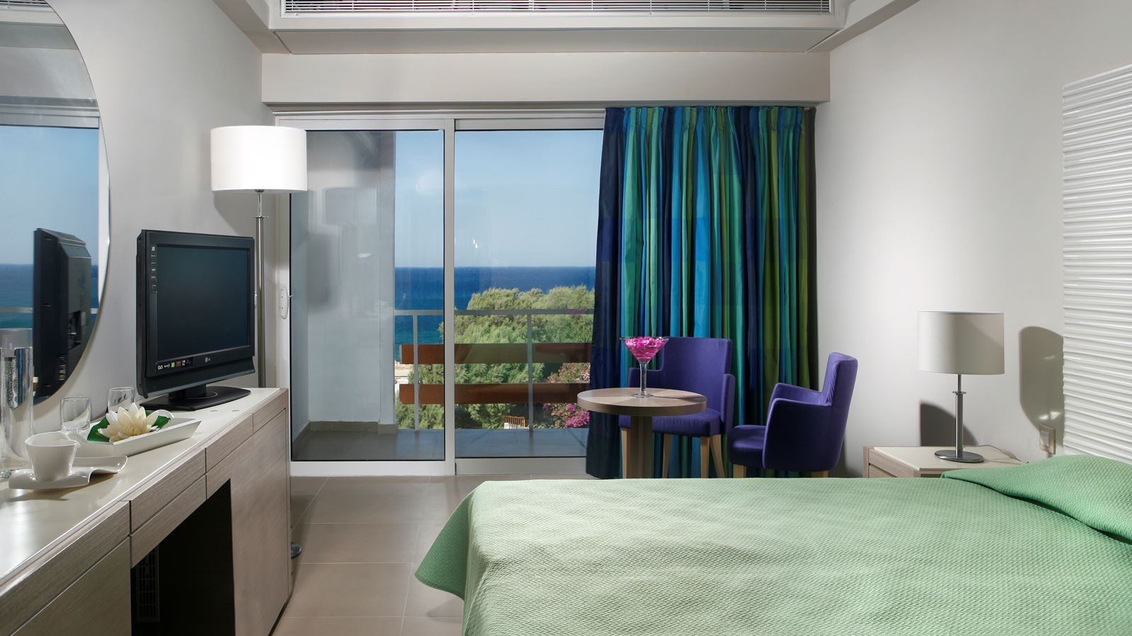 rooms-single-room-garden-view-with-balcony