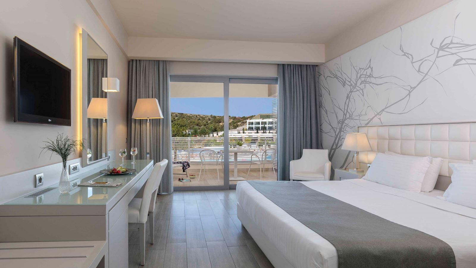 rooms-deluxe-room-pool-view-balcony-or-terrace